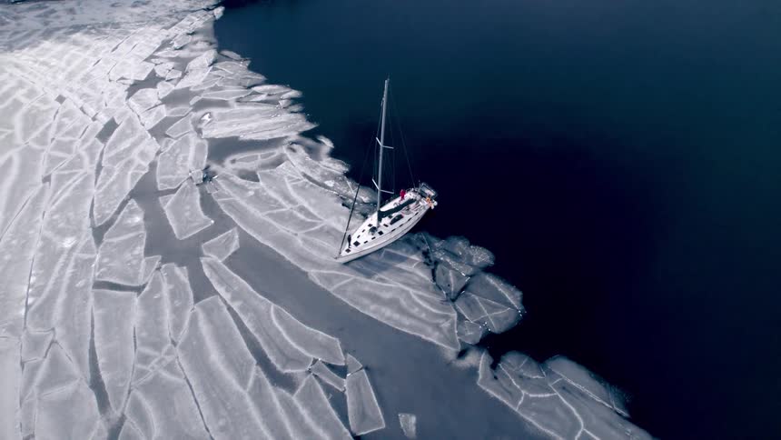 The boat is wedged into the frozen sea