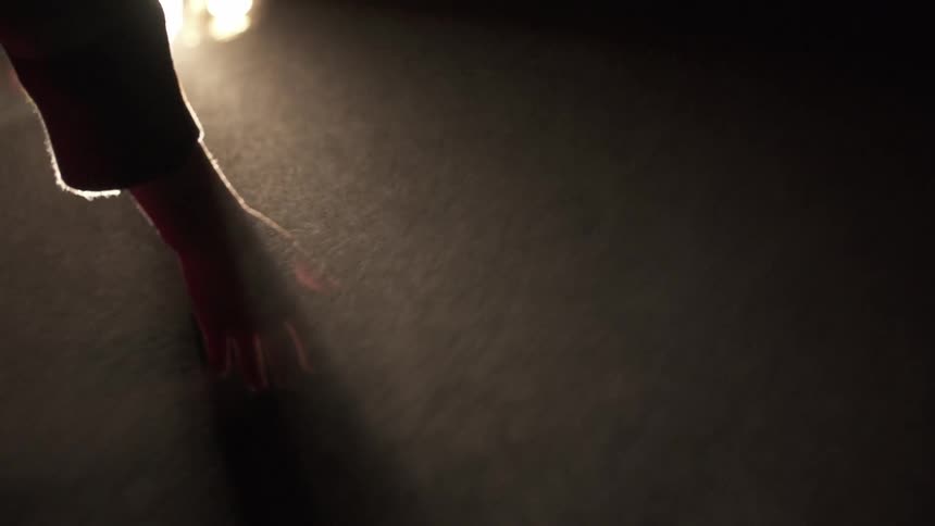 A hand in a sunbeam