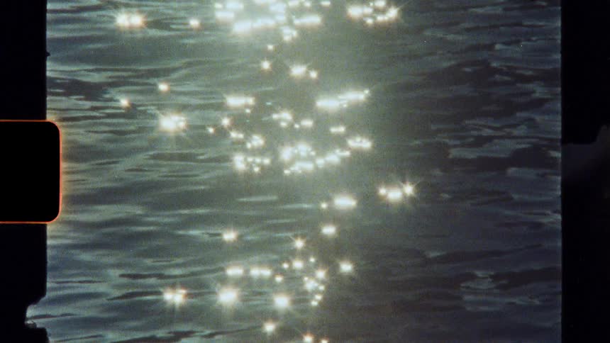 Reflection of the sun in calm waters of the ocean