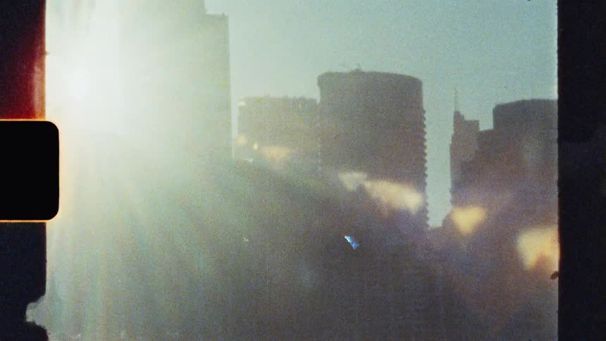 Reflection of the sun between buildings in a metropolis