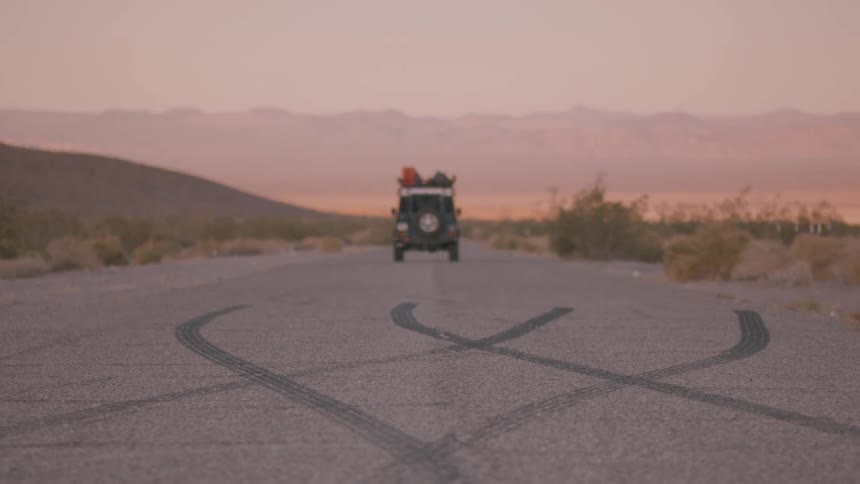 A jeep driving away