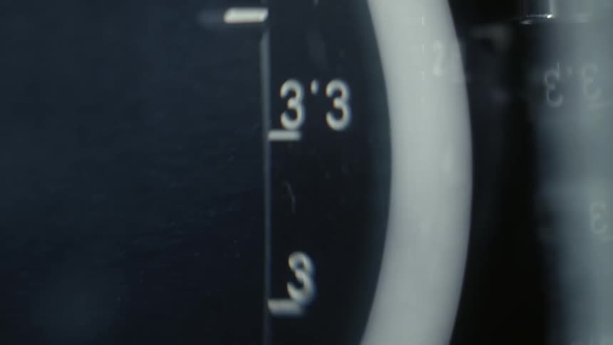 Numbers scroll past while changing settings on a machine
