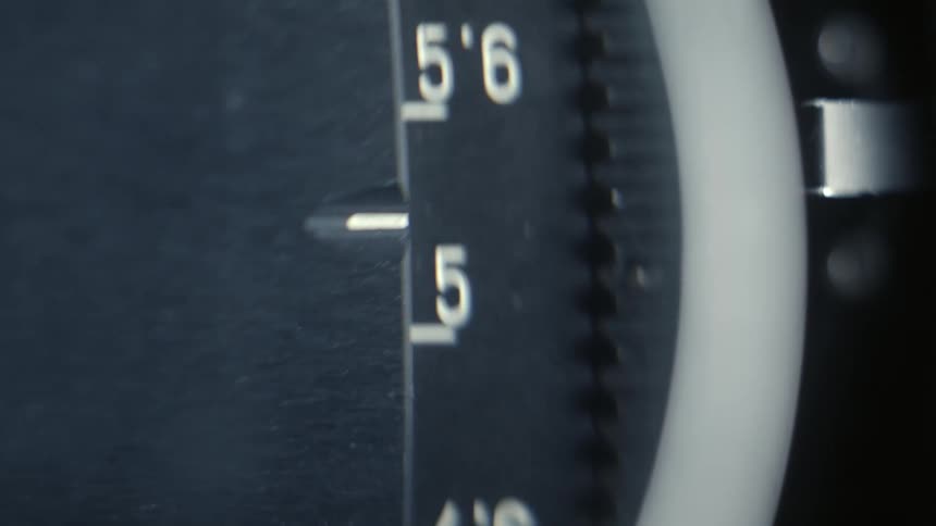 Closeup of a tachometer gauge