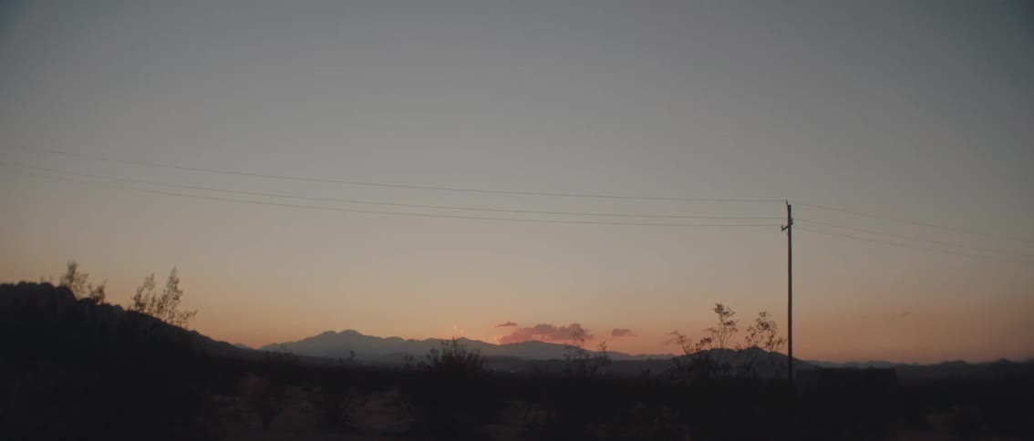 Silhouette of mountains in a landscape at dawn