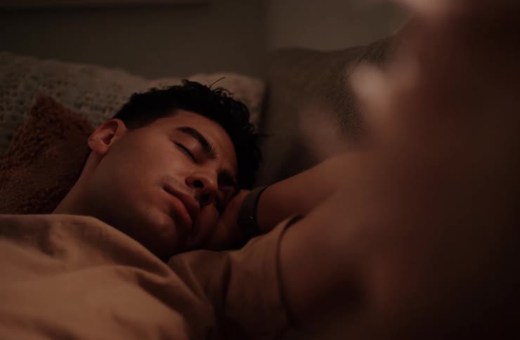 Man lying in bed sleeping