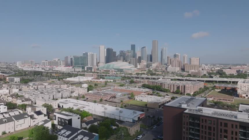 Panorama of a suburb in the foreground and skyscrapers of a metropolis in the background