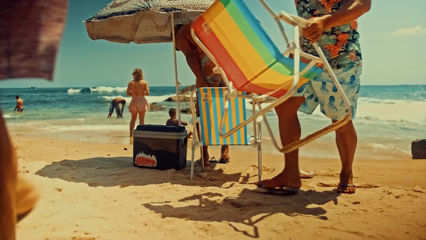 People walking during the day on a beach