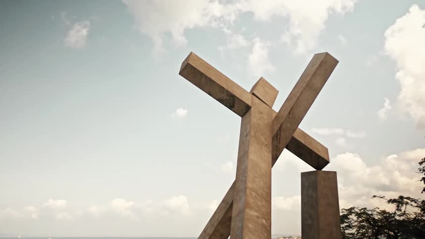 Abstract monument against a cloudy sky