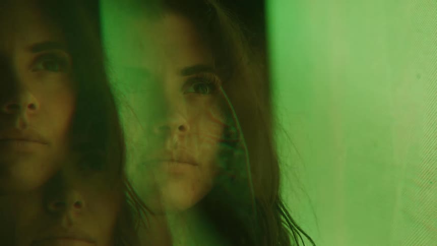 Abstract lights on a womans face and multiple exposures