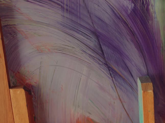 Screen being painted with purple paint