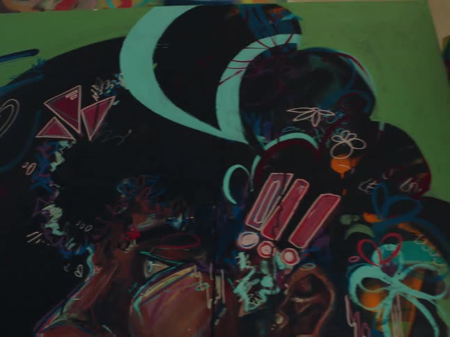 Artistic paintings displayed in an interior space