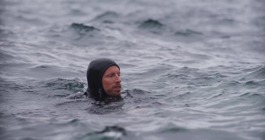 Man swimming in the ocean
