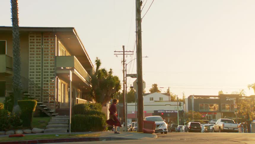 Busy urban street during sunset