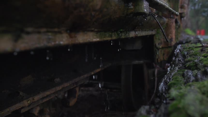 View underneath a structure on a rainy day