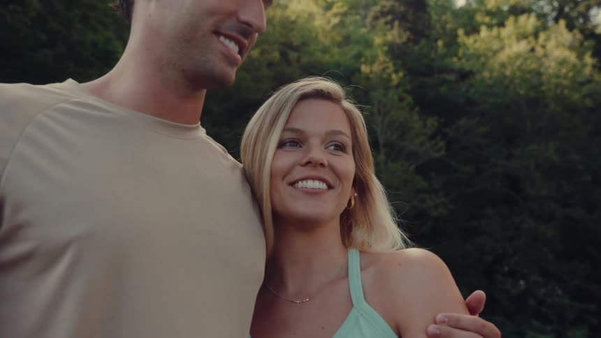 Couple outdoors hugging