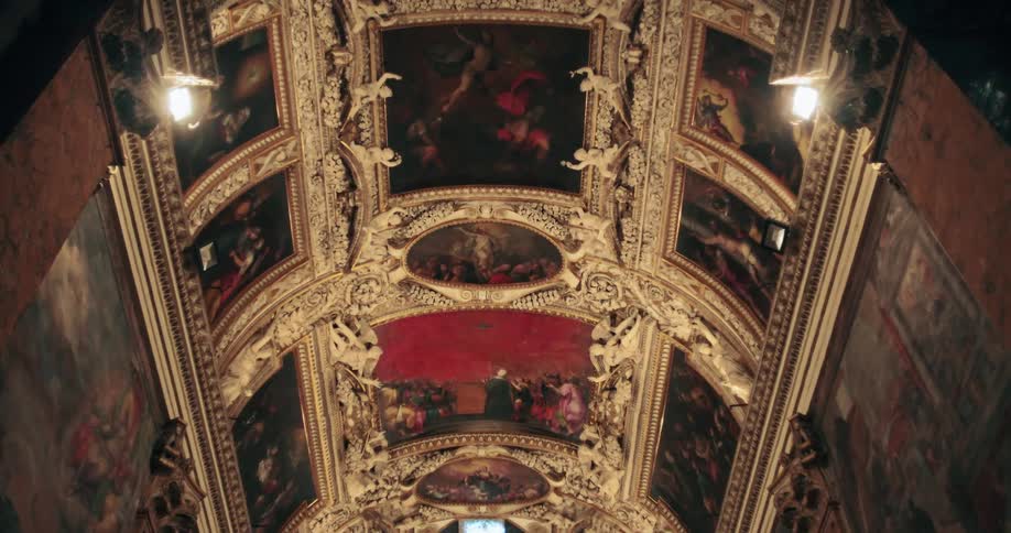 Painted ceilings indoors in a cathedral building during daytime