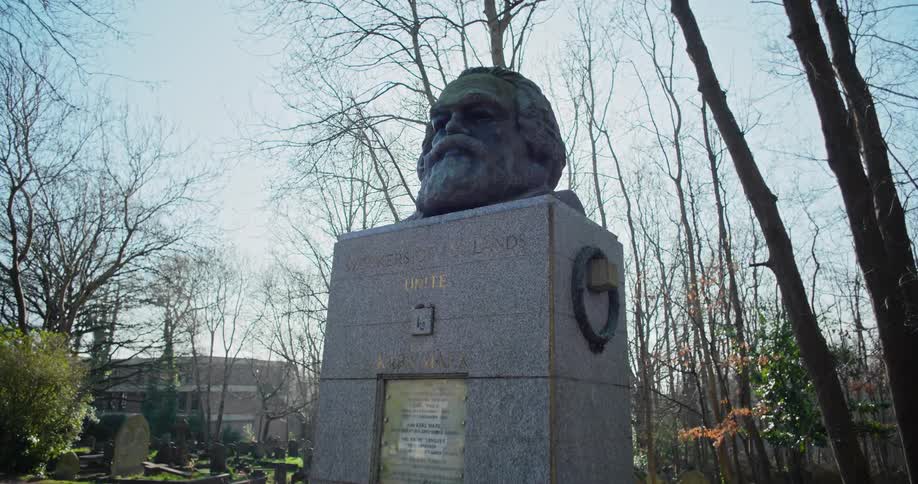 Monument in a square surrounded by leafless tree