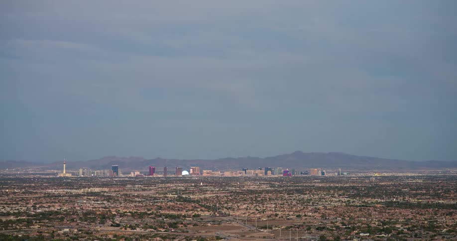 Panorama of a natural area with a city and buildings in the background