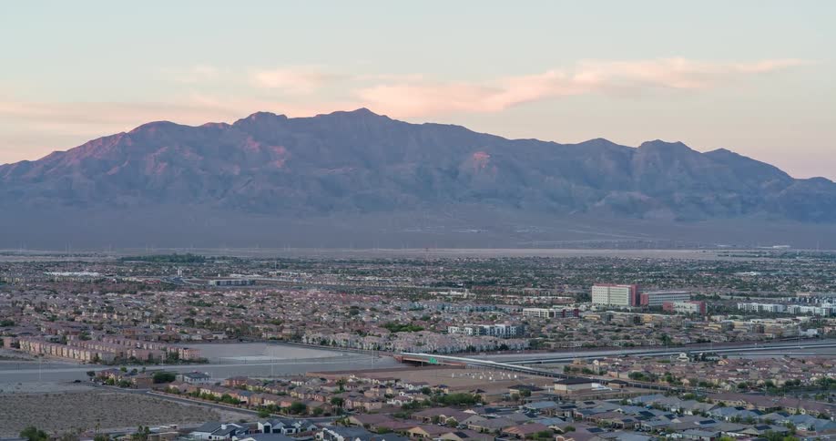 Urban city in an area surrounded by mountains