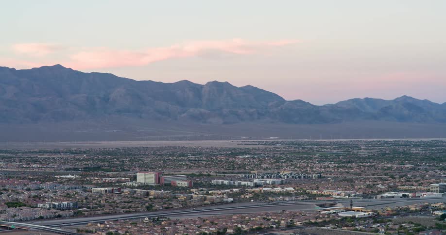 A mountain range lines the city