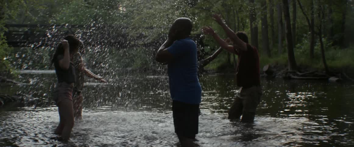 People play splashing in the water