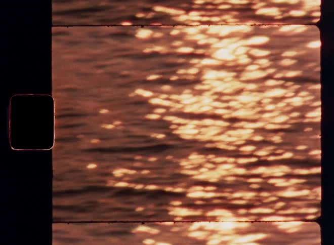 Sun glistening off rippling water in the ocean