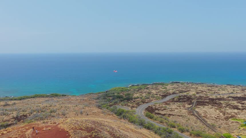 A kite flies over a landscape