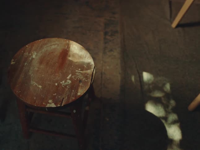 A wooden stool on the floor