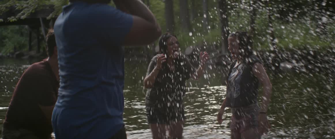 People playing in a lake