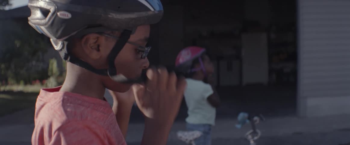 Children put on their bike helmets