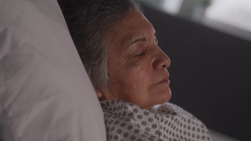 The patient is sleeping in the hospital