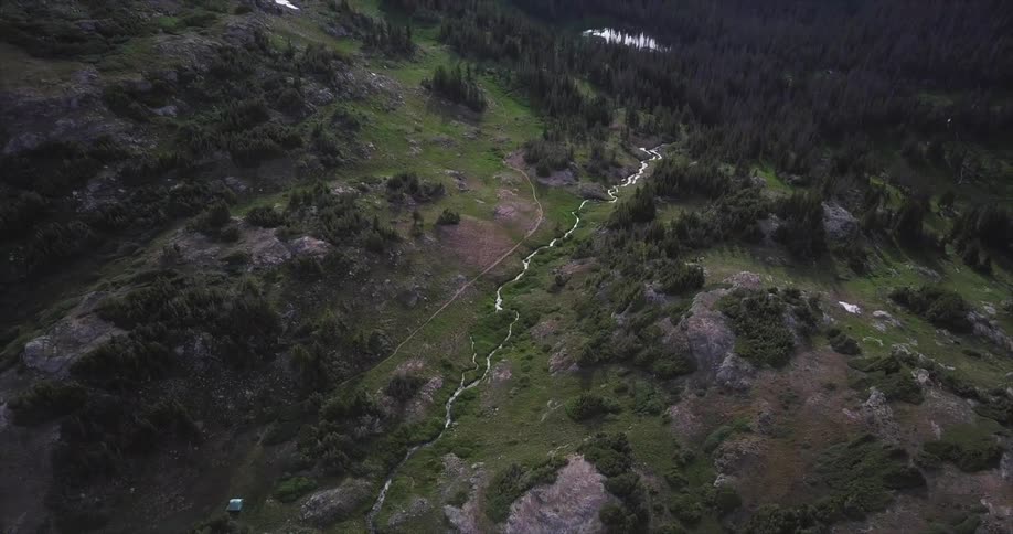 A river runs through a rocky valley