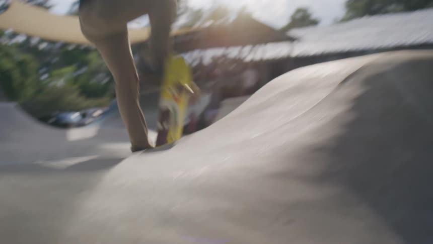 A man skateboarding at a skate park