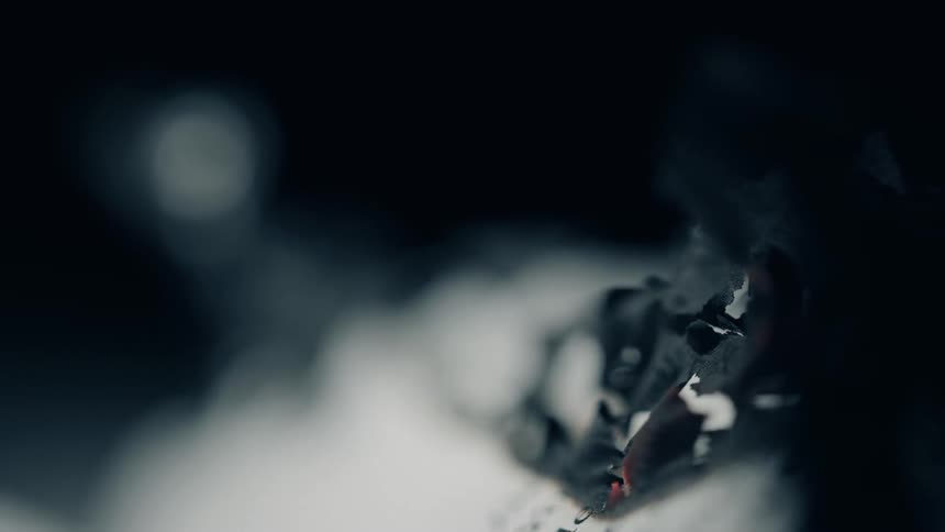 Paper curls while burning