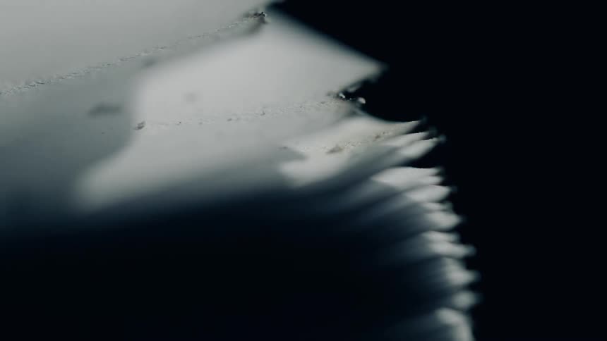 Closeup of overlapping pages reveals the texture of a books edges