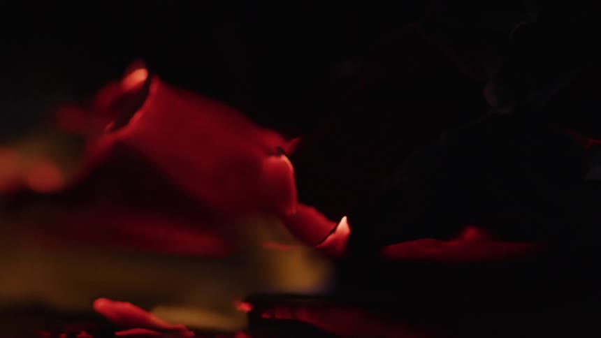 Close up of flames burning paper