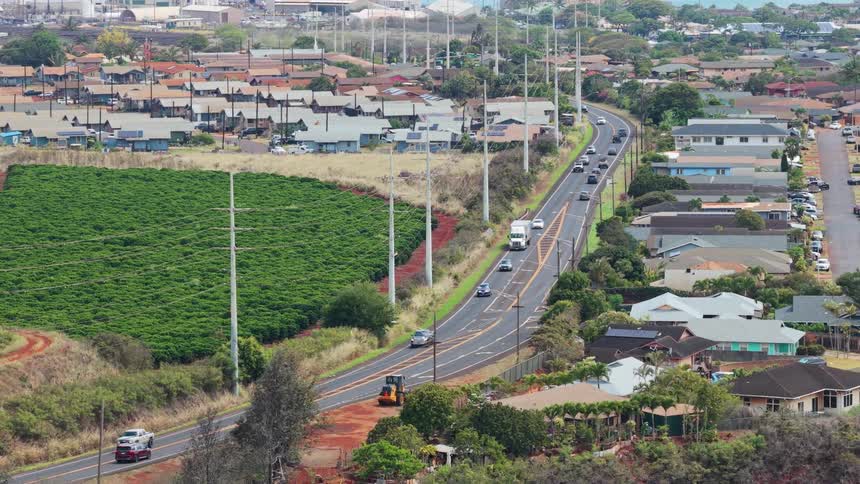 Traffic flows through the suburbs