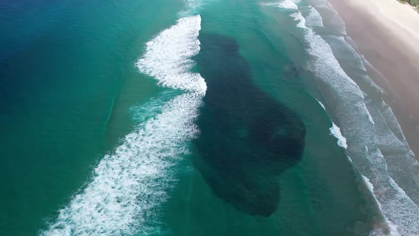 Waves wash up on the beach