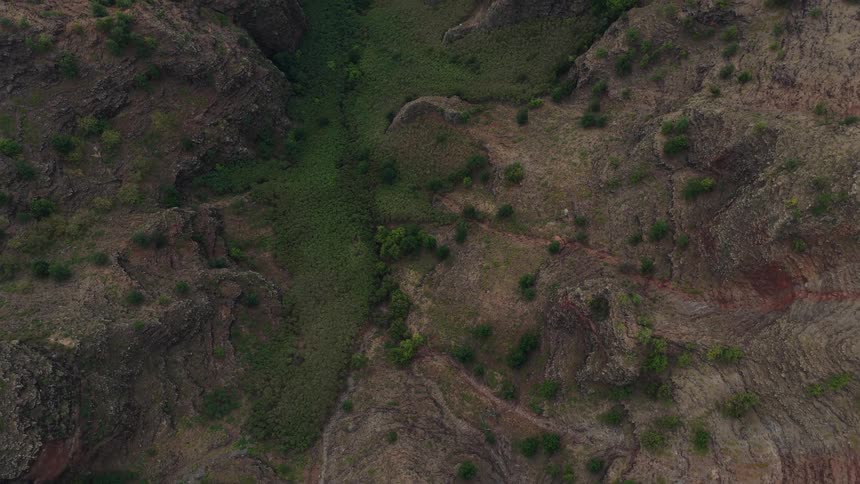 Flying over a long canyon