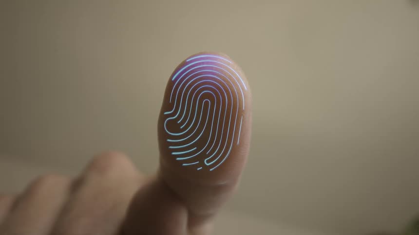 Index finger displays digital scan with glowing blue lines