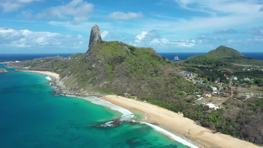 A mountain and hills by the ocean