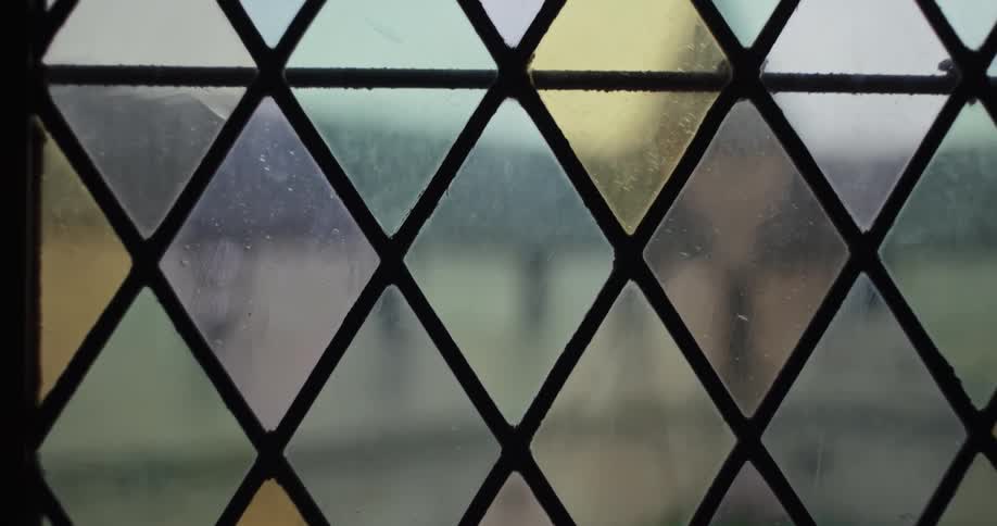 A church glass window with artistic colors