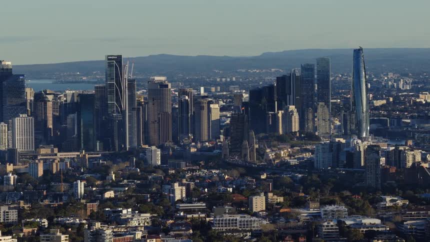 Panorama of a metropolis with modern skyscrapers and the sea in the background