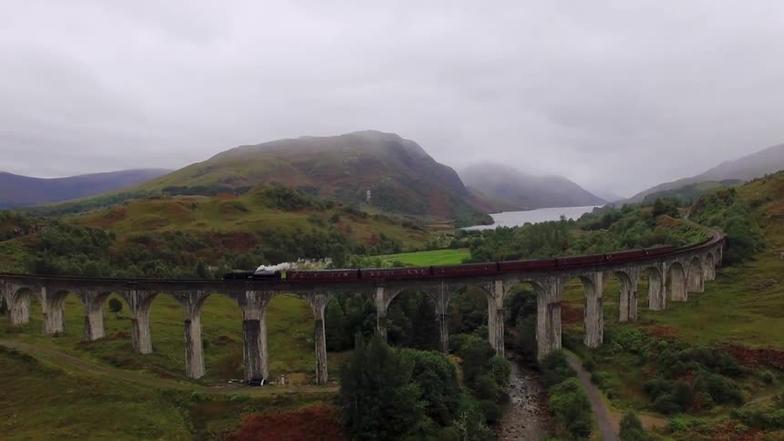 A bridge stands above a narrow river
