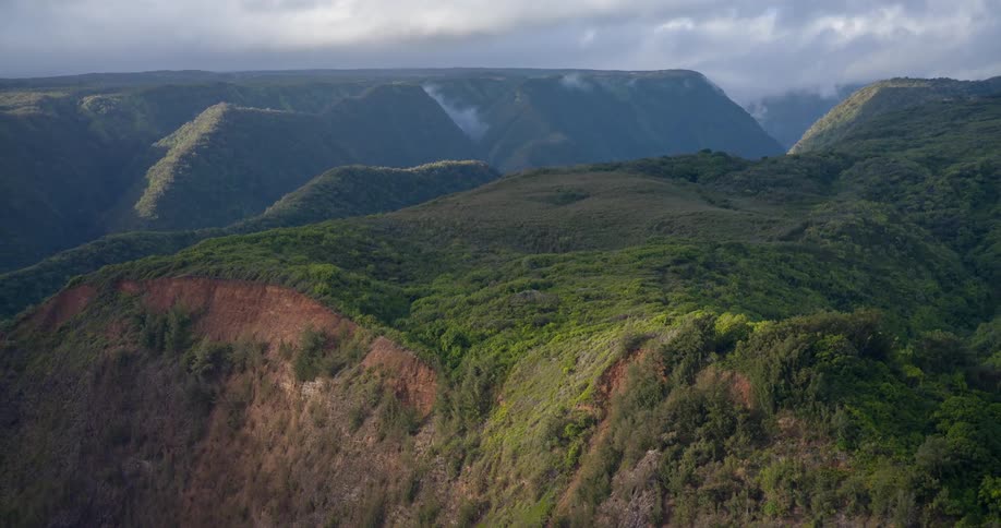 The tops of some green mountains