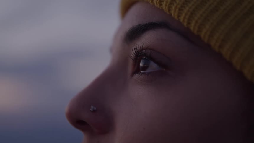 A woman is crying outside