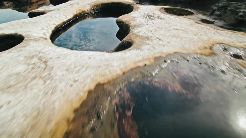 Rock formations with pools of accumulated water
