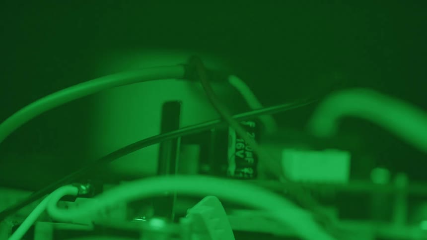 Electronic circuit viewed under green lighting