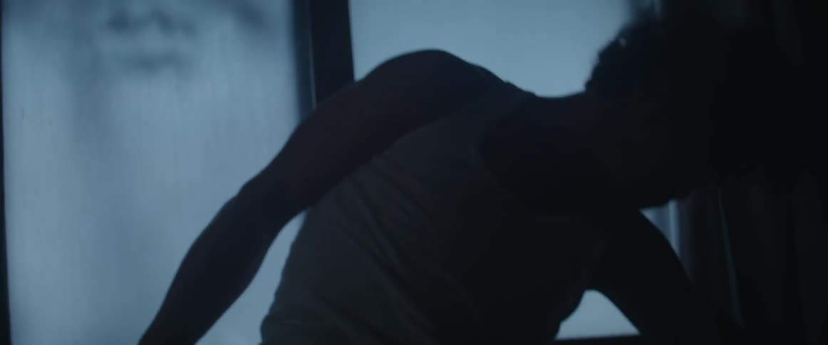 A man is swinging hitting something