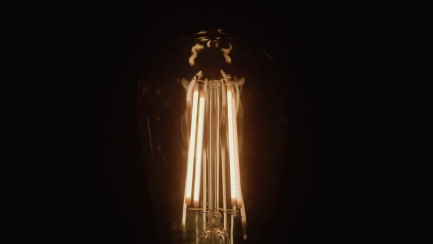The light bulb dims